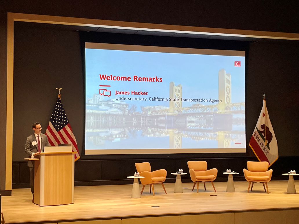 James Hacker doing the welcome remarks at Rail Innovation Day 2025